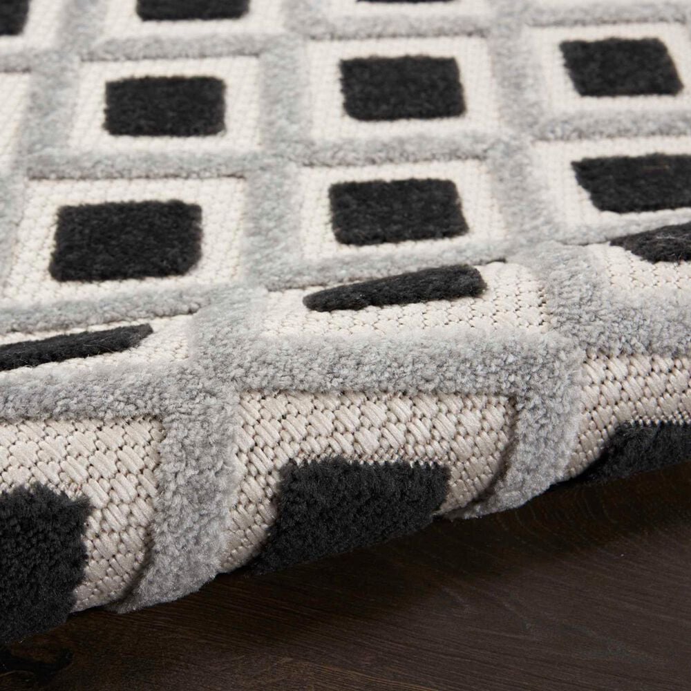181450-nourison-aloha-geometric-5-3-round-black-and-white-indoor-outdoor-area-rug-1.jpg