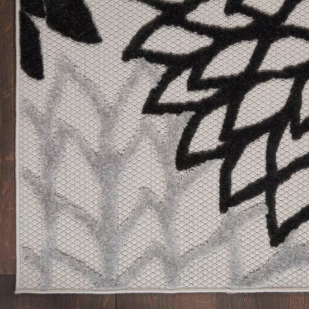 181467-nourison-aloha-floral-7-x-10-black-and-white-indoor-outdoor-area-rug-1.jpg