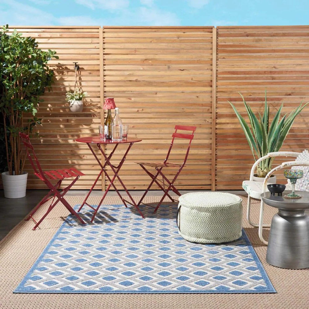 181692-nourison-aloha-alh26-5-3-x-7-5-blue-and-grey-indoor-outdoor-area-rug-1.jpg