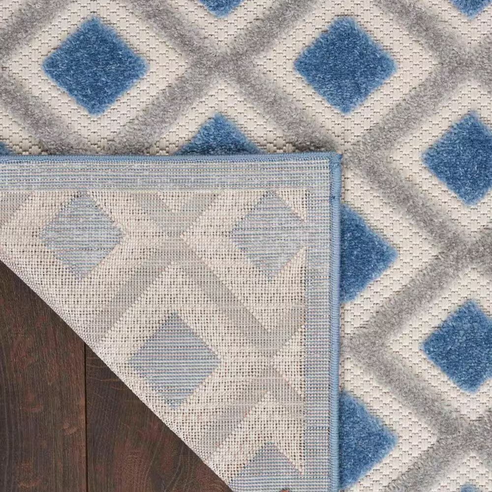 181692-nourison-aloha-alh26-5-3-x-7-5-blue-and-grey-indoor-outdoor-area-rug-1.jpg