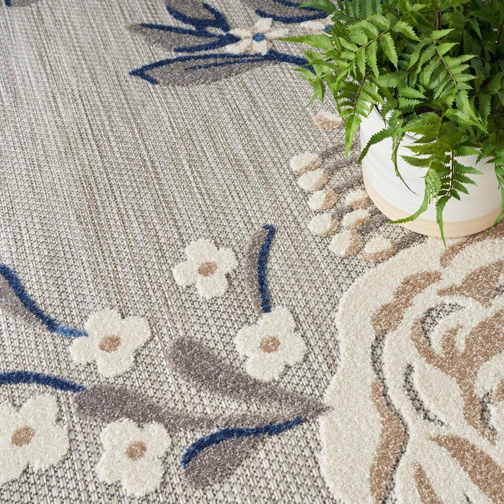 181702-nourison-aloha-alh32-5-3-x-7-5-blue-and-grey-indoor-outdoor-area-rug-1.jpg