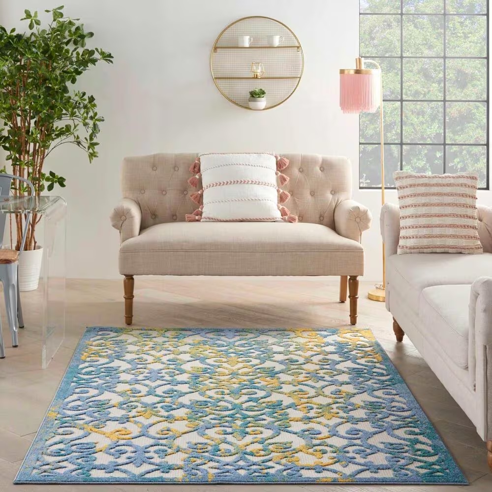 182325-nourison-aloha-5-3-x-7-5-ivory-and-blue-indoor-outdoor-area-rug-1.jpg