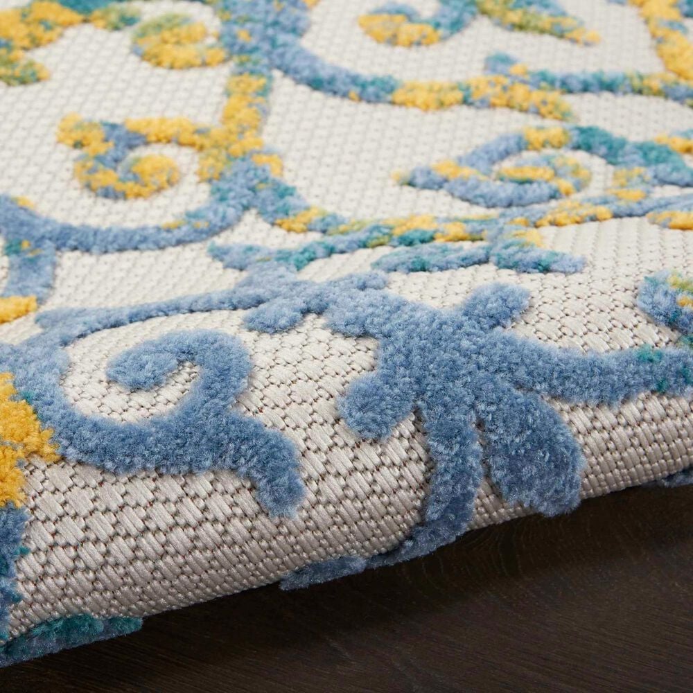 182325-nourison-aloha-5-3-x-7-5-ivory-and-blue-indoor-outdoor-area-rug-1.jpg