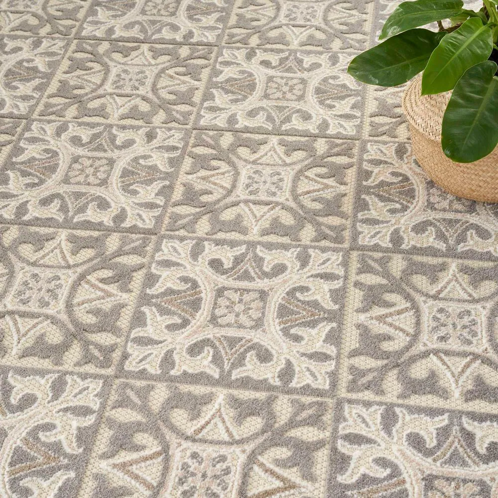 182358-nourison-aloha-damask-5-3-x-7-5-ivory-and-grey-indoor-outdoor-area-rug-1.jpg