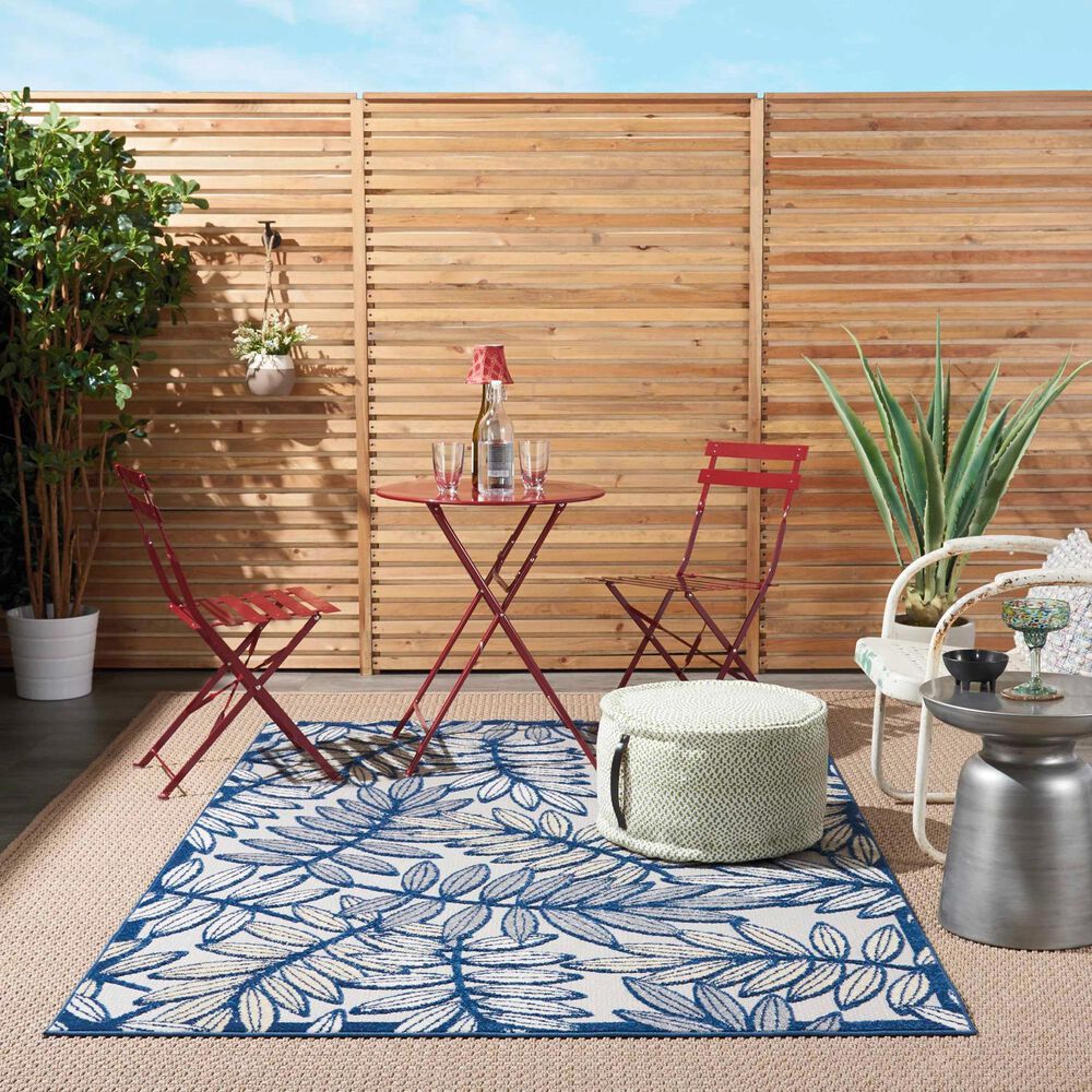 182502-nourison-aloha-alh18-5-3-x-7-5-ivory-and-navy-indoor-outdoor-area-rug-1.jpg