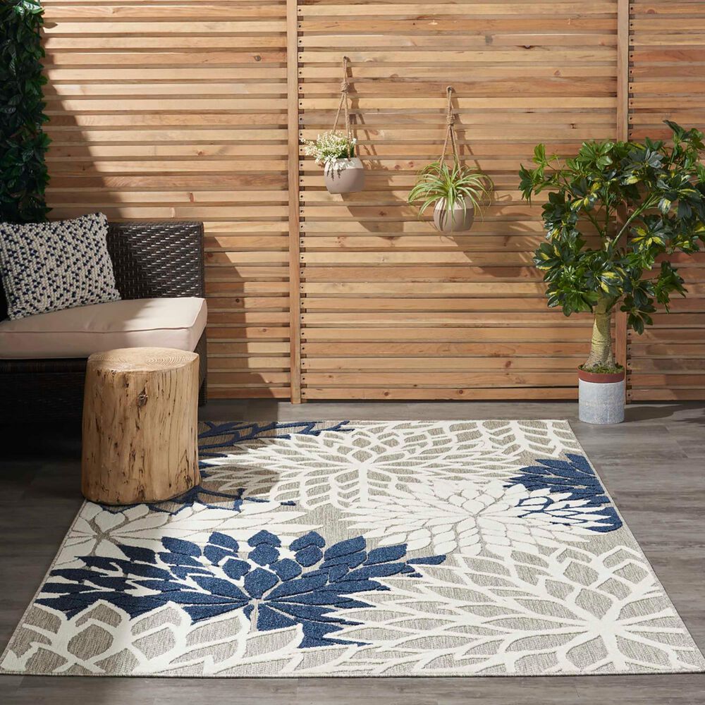 182509-nourison-aloha-alh05-6-x-9-ivory-and-navy-indoor-outdoor-area-rug-1.jpg