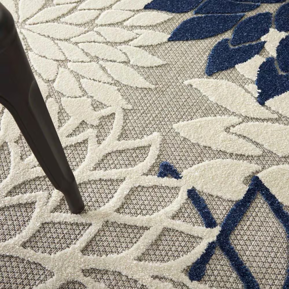 182509-nourison-aloha-alh05-6-x-9-ivory-and-navy-indoor-outdoor-area-rug-1.jpg
