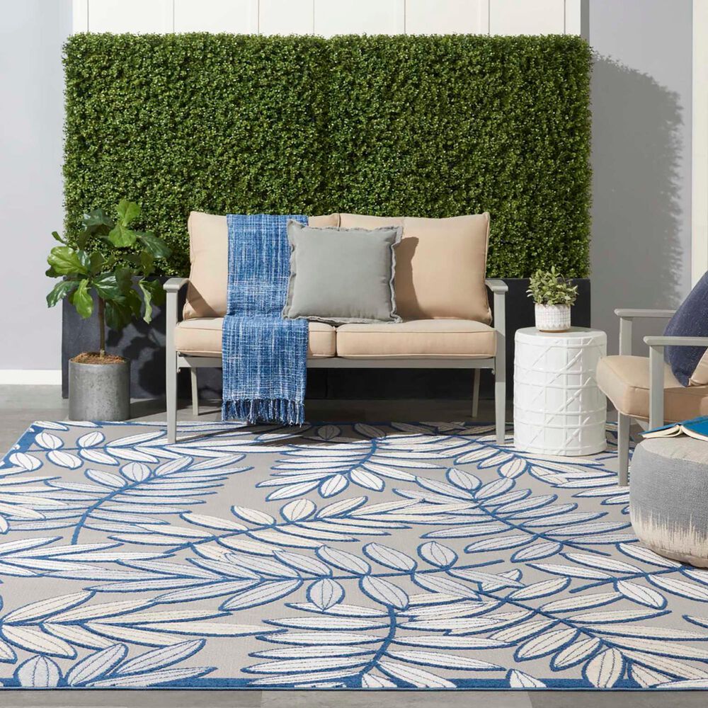 182529-nourison-aloha-alh18-7-x-10-ivory-and-navy-indoor-outdoor-area-rug-1.jpg