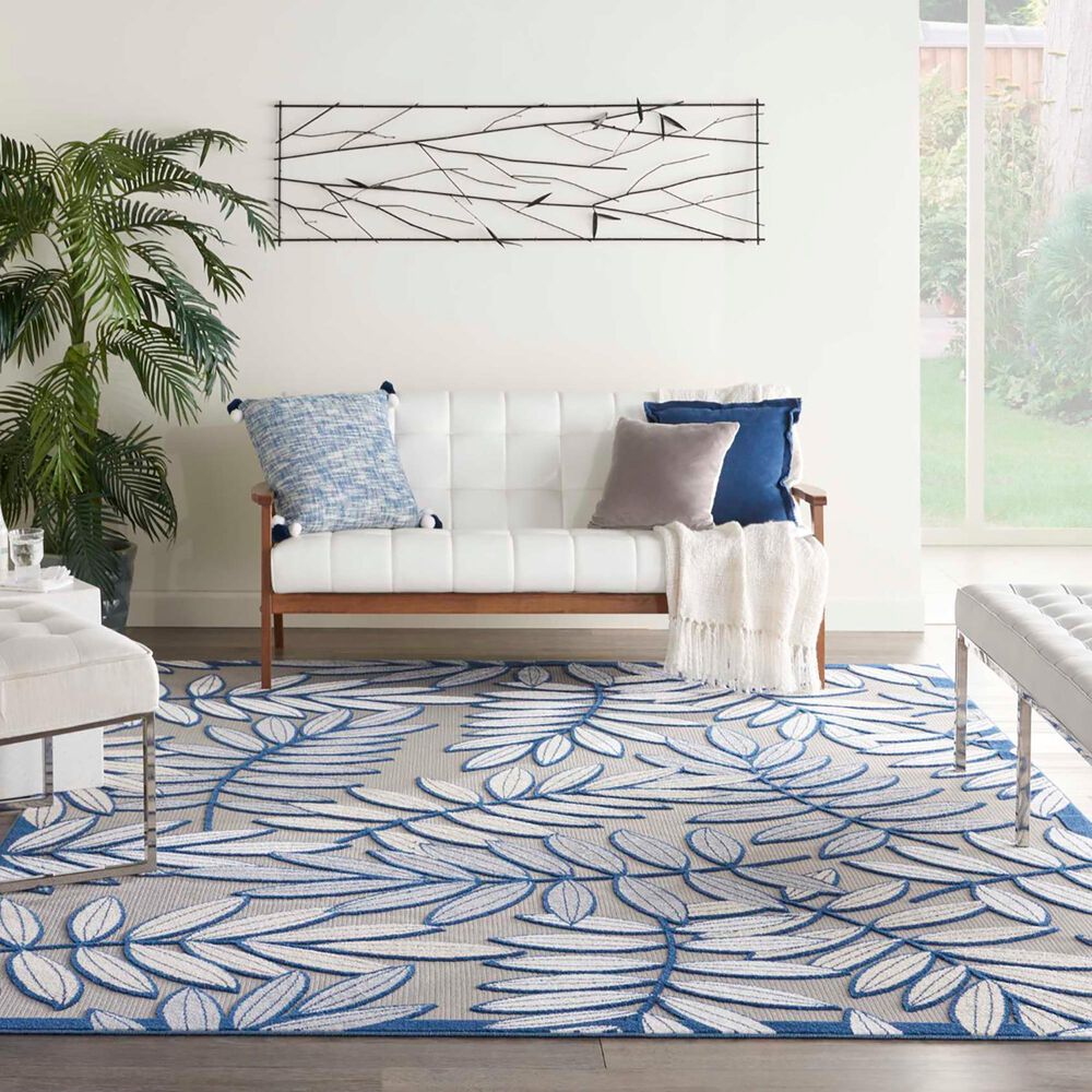 182553-nourison-aloha-alh18-9-x-12-ivory-and-navy-indoor-outdoor-area-rug-1.jpg