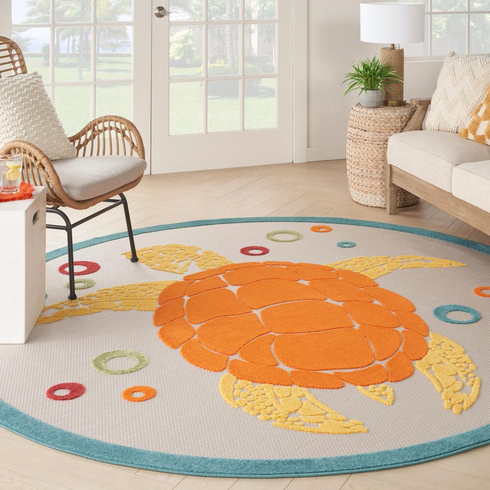 183467-nourison-aloha-5-3-round-teal-and-multicolor-indoor-outdoor-area-rug-1.jpg