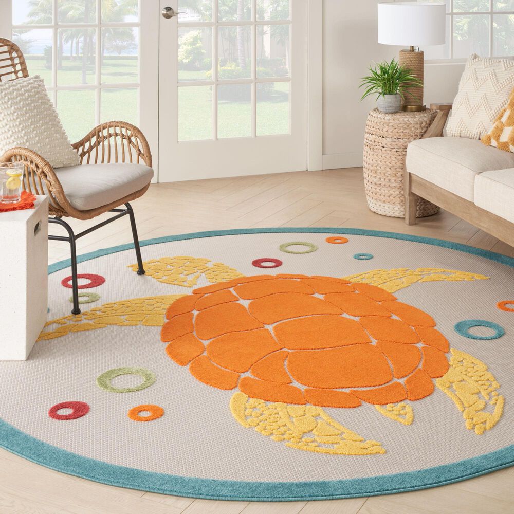 183467-nourison-aloha-5-3-round-teal-and-multicolor-indoor-outdoor-area-rug-1.jpg