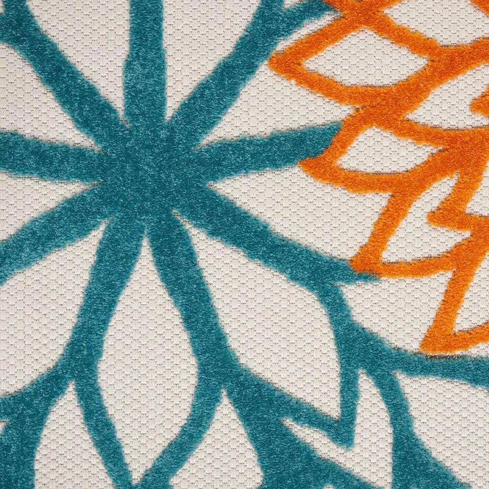 183506-nourison-aloha-7-10-x-10-6-turquoise-and-multicolor-indoor-outdoor-area-rug-1.jpg