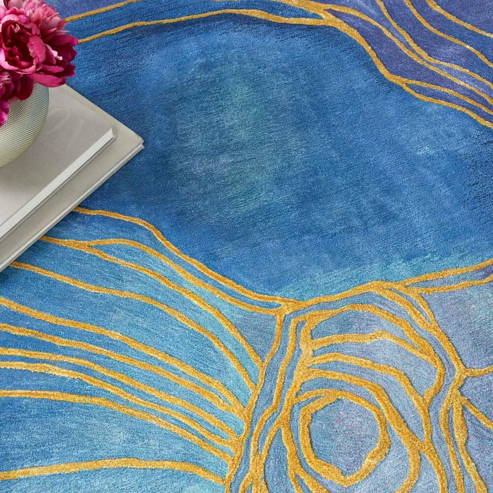 183554-nourison-prismatic-blue-and-gold-9-9-x-13-9-area-rug-1.jpg