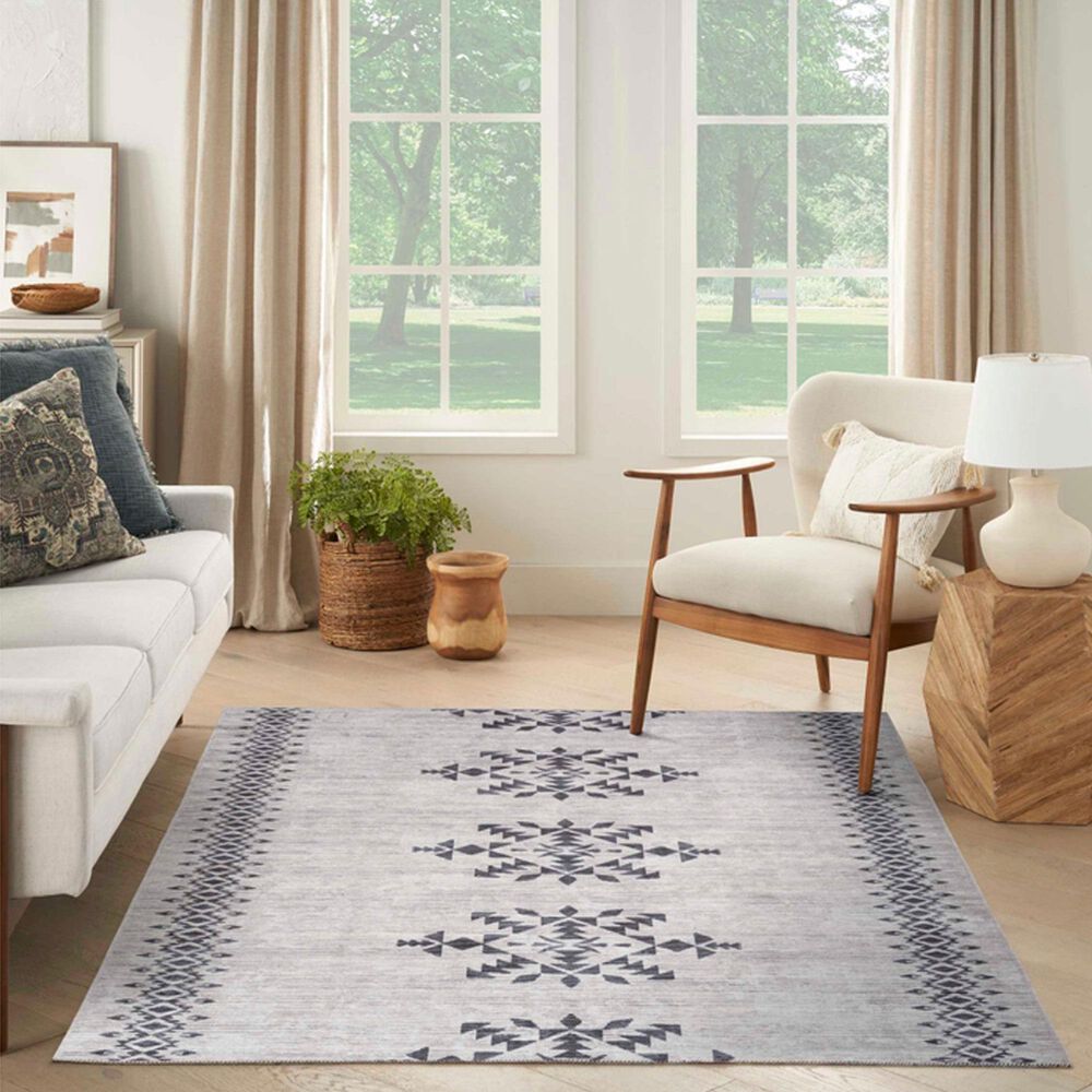 183781-nourison-machine-washable-series-1-5-3-x-7-3-ivory-and-charcoal-area-rug-1.jpg