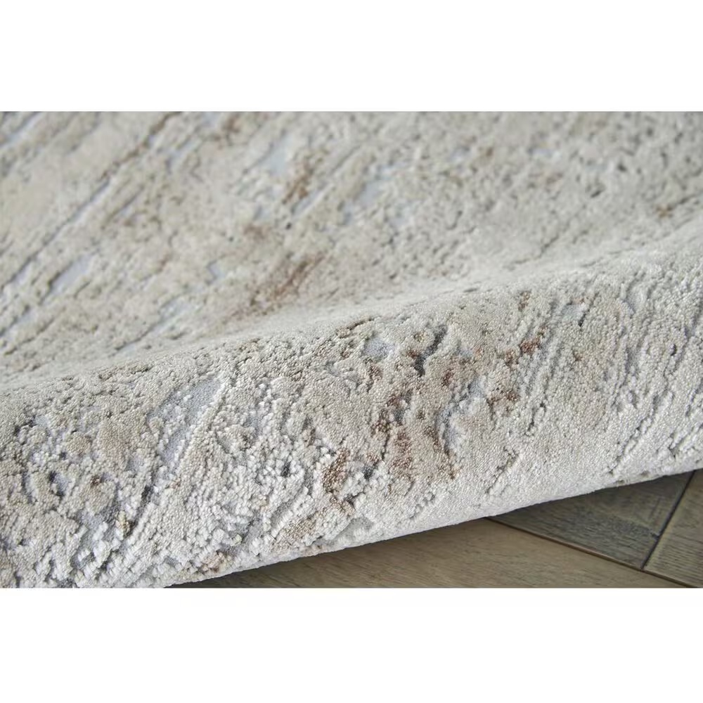 27773-nourison-rustic-textures-rus03-3-11-x-5-11-beige-area-rug-1.jpg