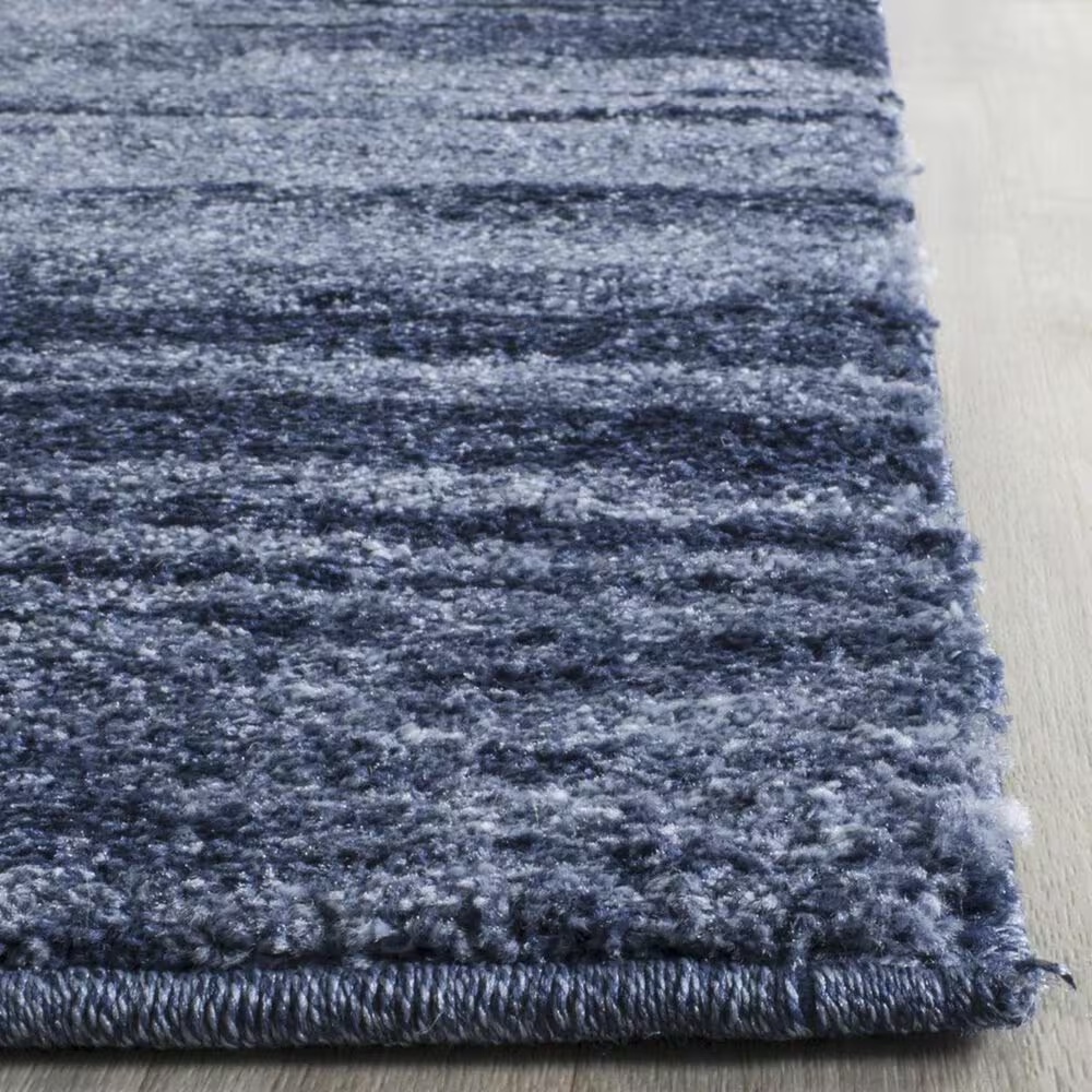 33705-safavieh-retro-ret2693-6065-3-x-5-light-blue-and-blue-area-rug-1.jpg