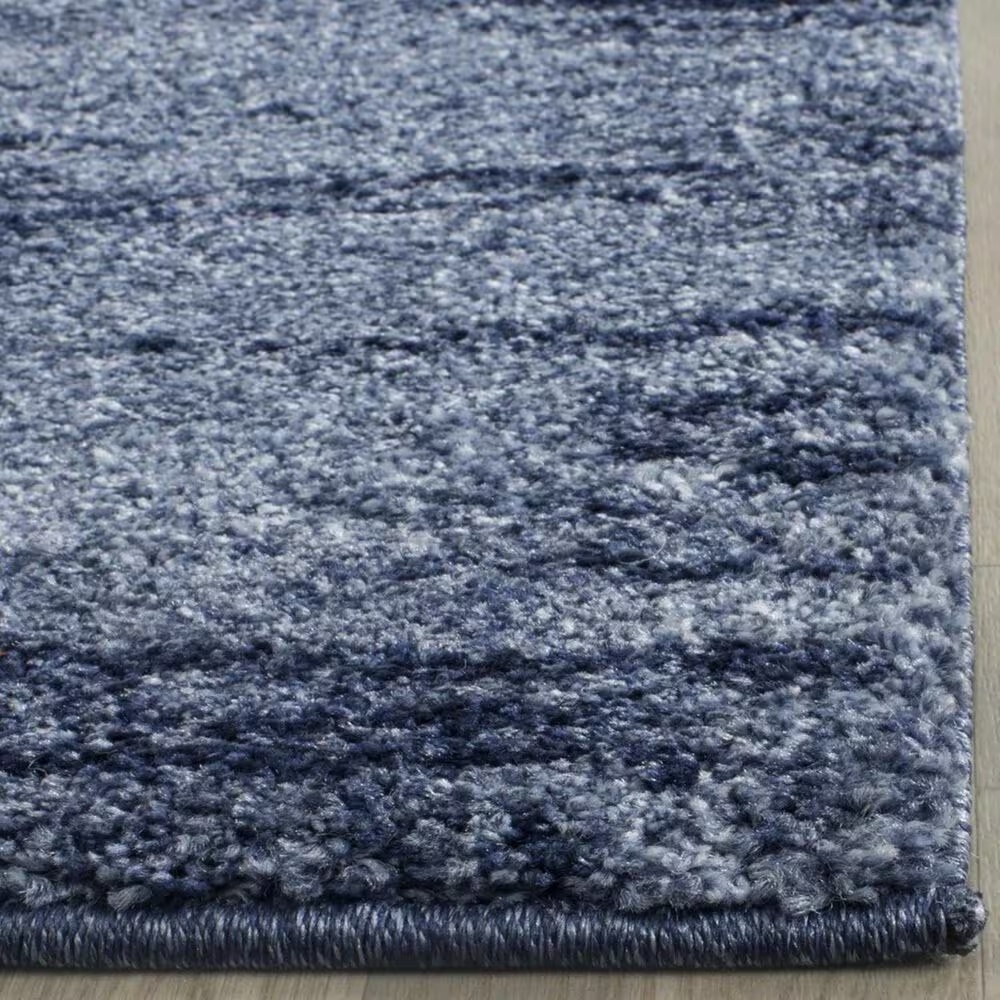 33705-safavieh-retro-ret2693-6065-3-x-5-light-blue-and-blue-area-rug-1.jpg