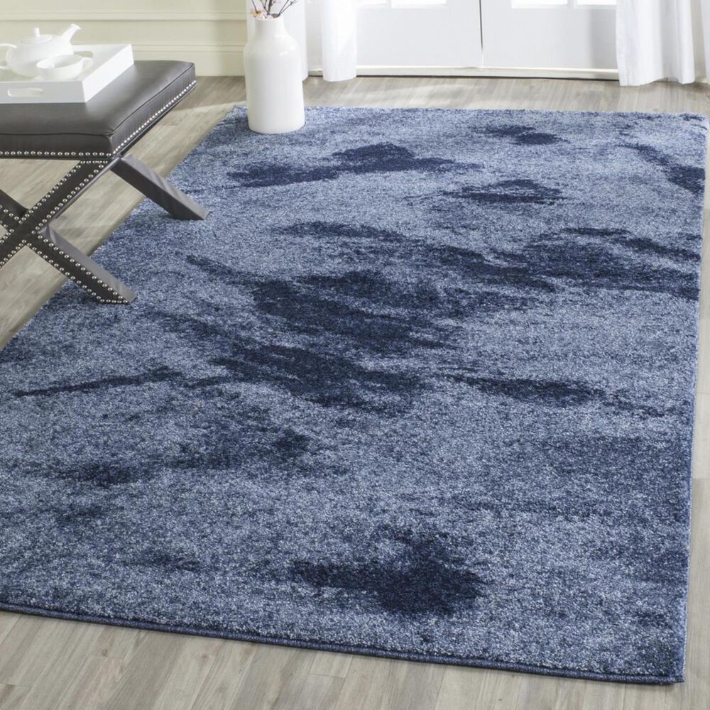 33725-safavieh-retro-ret2891-6065-5-x-8-light-blue-and-blue-area-rug-1.jpg
