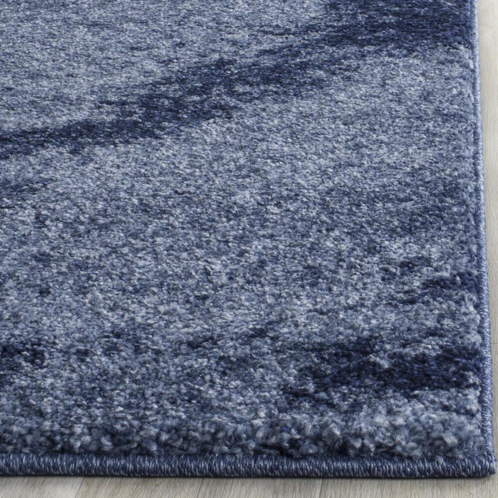 33725-safavieh-retro-ret2891-6065-5-x-8-light-blue-and-blue-area-rug-1.jpg