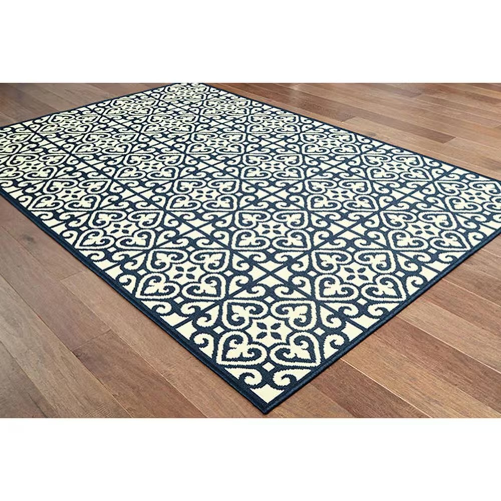 39206-oriental-weavers-marina-5927b-5-3-x-7-6-ivory-and-navy-area-rug-1.jpg