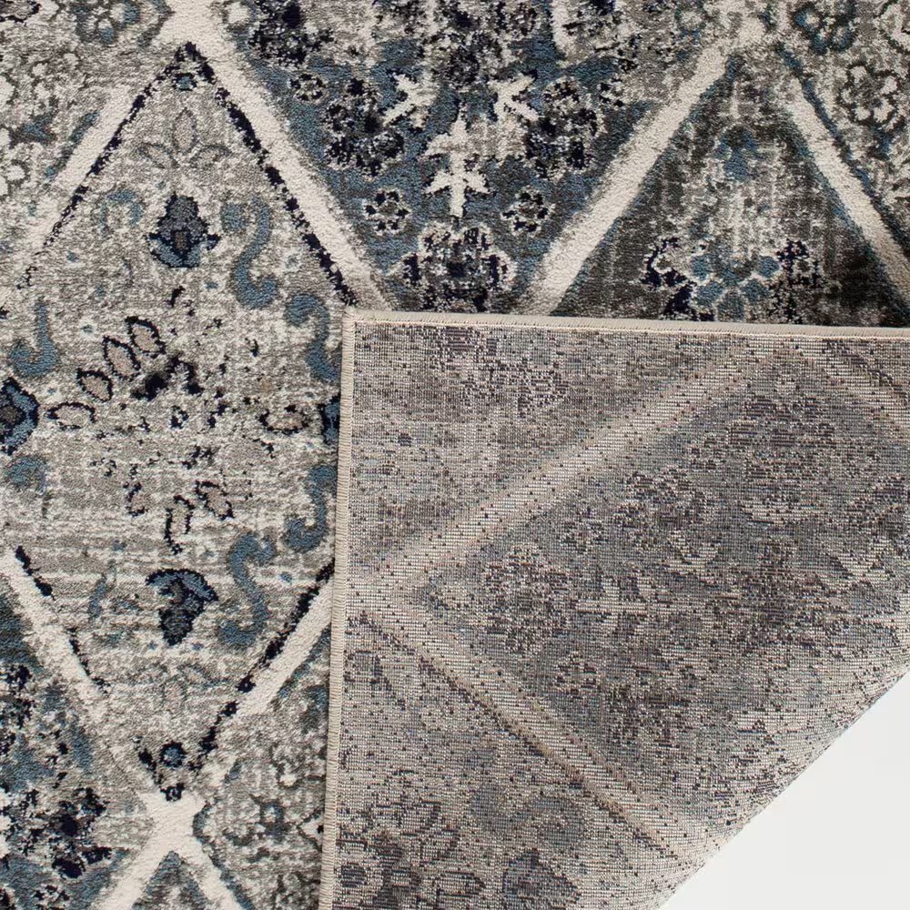44834-central-oriental-corso-braddyville-7-10-x-9-10-tan-and-blue-area-rug-1.jpg