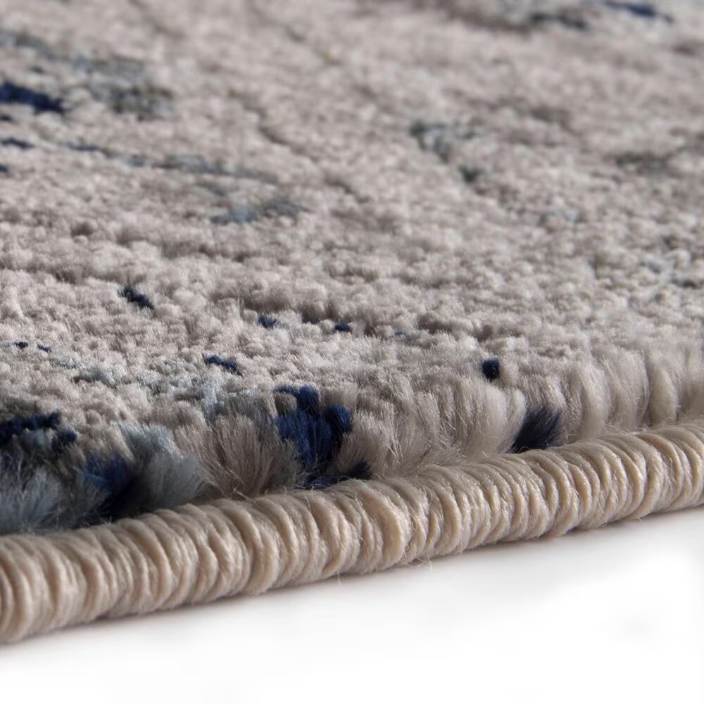 44834-central-oriental-corso-braddyville-7-10-x-9-10-tan-and-blue-area-rug-1.jpg
