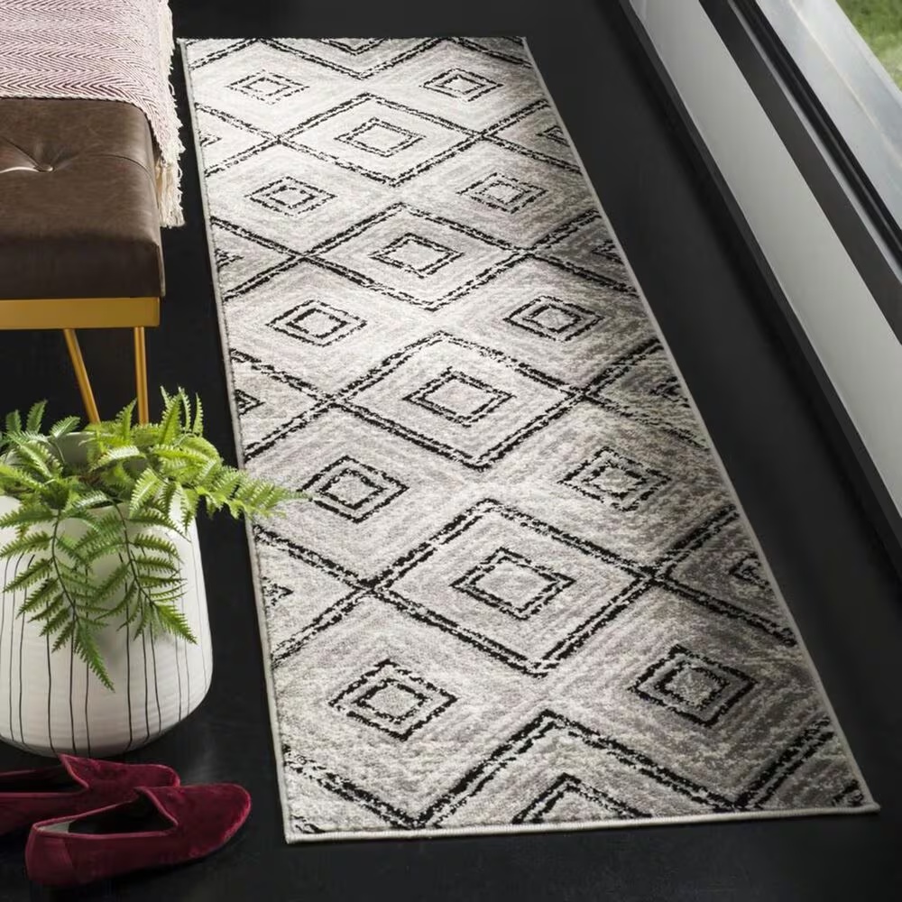 46849-safavieh-skyler-sky120j-2-x-6-grey-and-black-scatter-rug-1.jpg