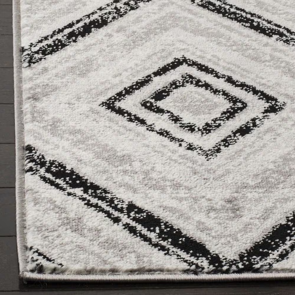 46859-safavieh-skyler-sky120j-5-1-x-7-6-grey-and-black-area-rug-1.jpg