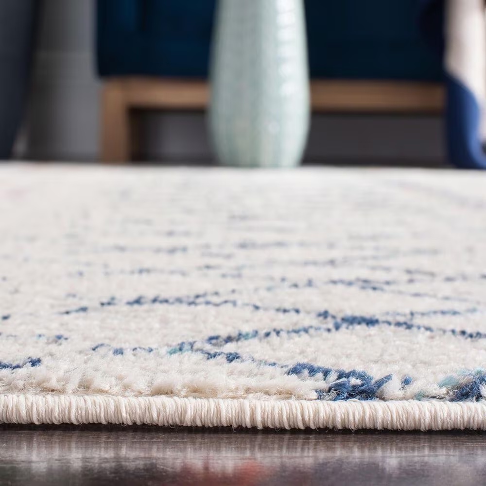 47329-safavieh-madison-mad798b-4-x-6-ivory-and-navy-area-rug-1.jpg