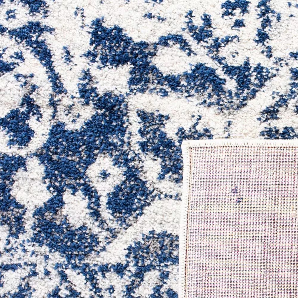 47522-safavieh-madison-mad603d-12-x-15-cream-and-navy-area-rug-1.jpg