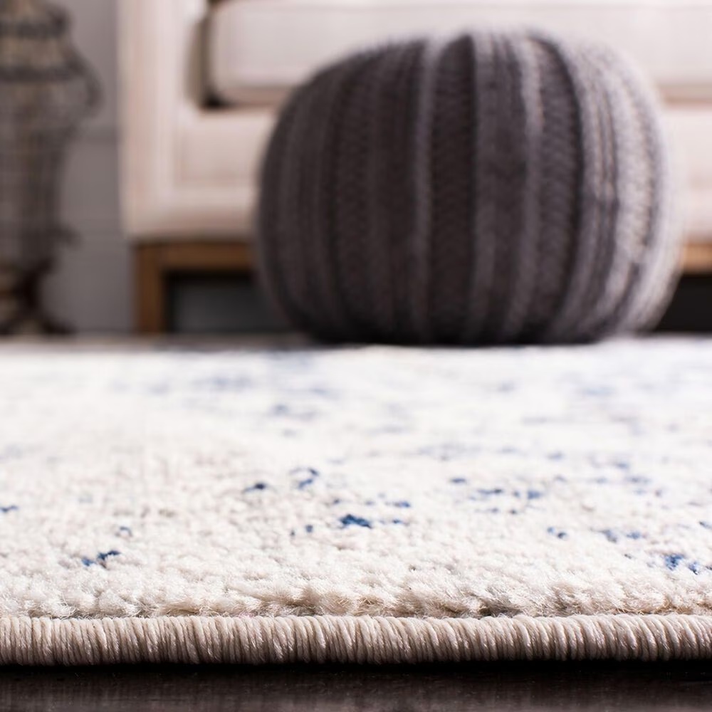 48050-safavieh-madison-mad603d-12-x-18-cream-and-navy-area-rug-1.jpg