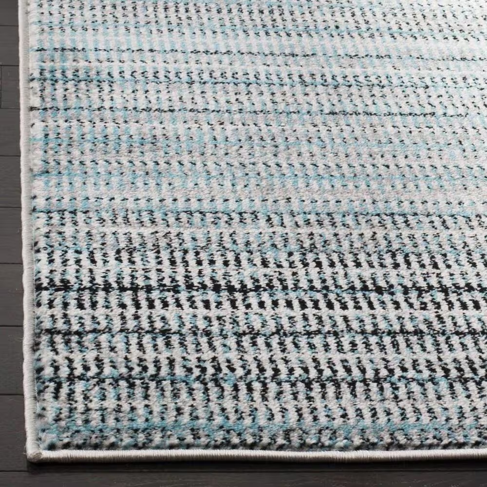 50217-safavieh-skyler-sky196c-5-1-x-7-6-blue-and-gray-area-rug-1.jpg