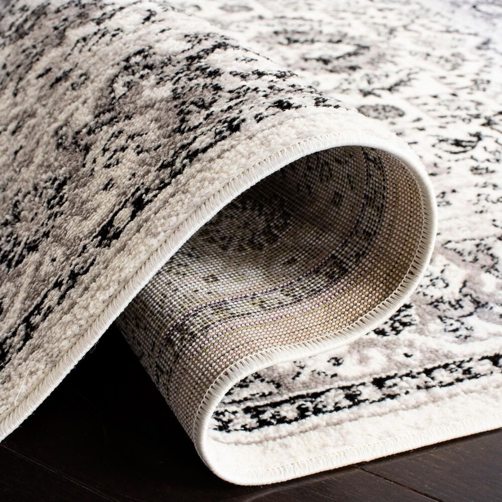 50363-safavieh-skyler-sky126k-10-x-14-grey-and-ivory-area-rug-1.jpg
