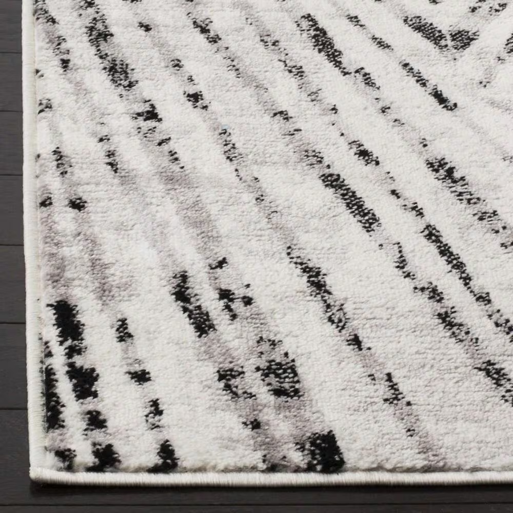 50669-safavieh-skyler-sky191k-5-1-x-7-6-gray-and-ivory-area-rug-1.jpg