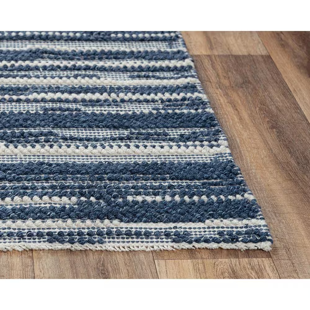 51262-rizzy-capri-7-6-x-9-6-ivory-and-blue-area-rug-1.jpg