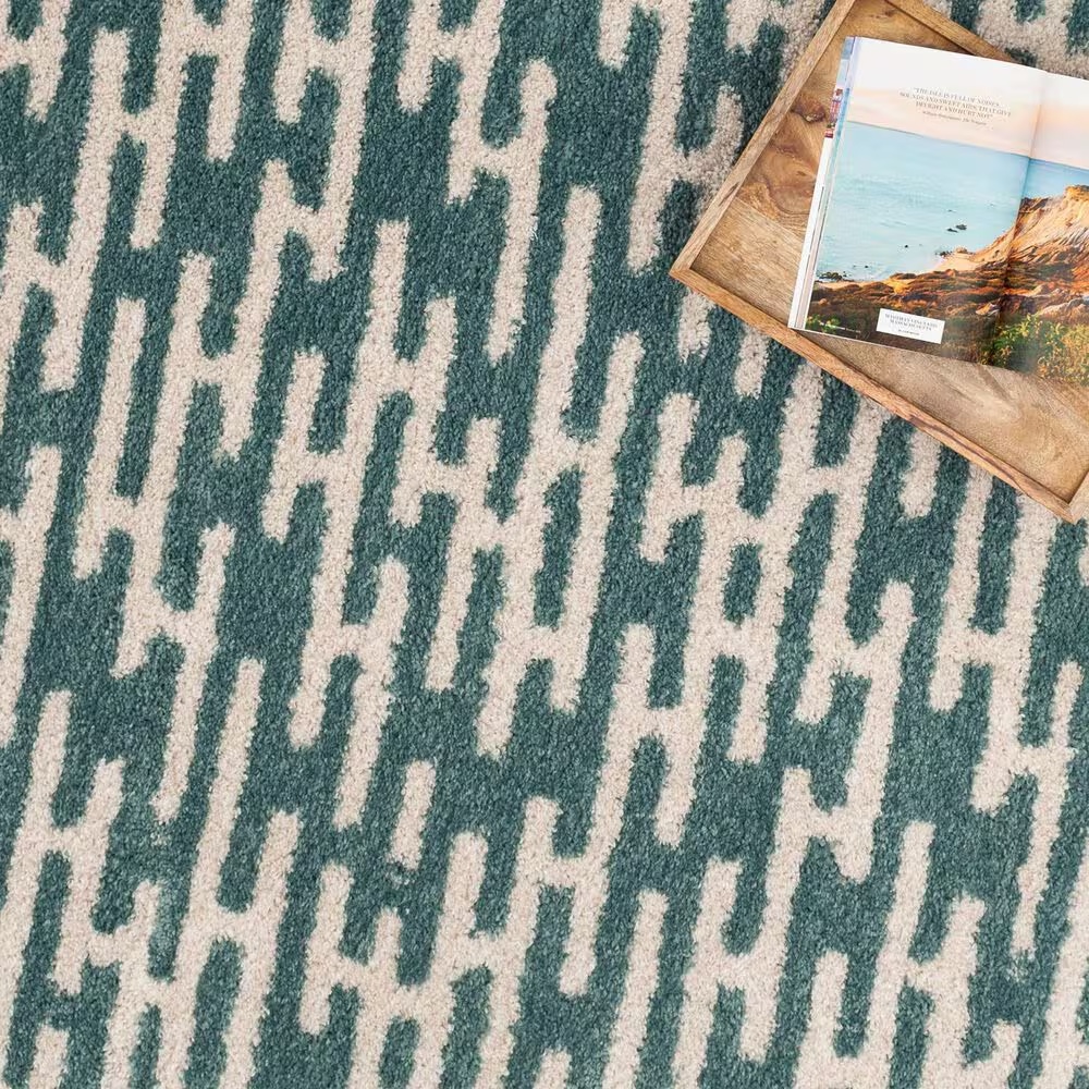 55426-central-oriental-tulsa-gordie-7-10-x-9-10-aqua-and-white-sand-area-rug-1.jpg