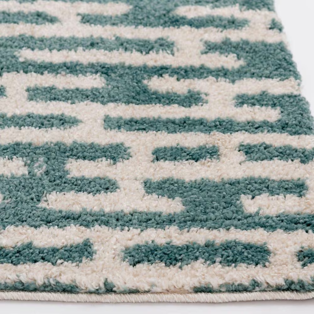 55426-central-oriental-tulsa-gordie-7-10-x-9-10-aqua-and-white-sand-area-rug-1.jpg
