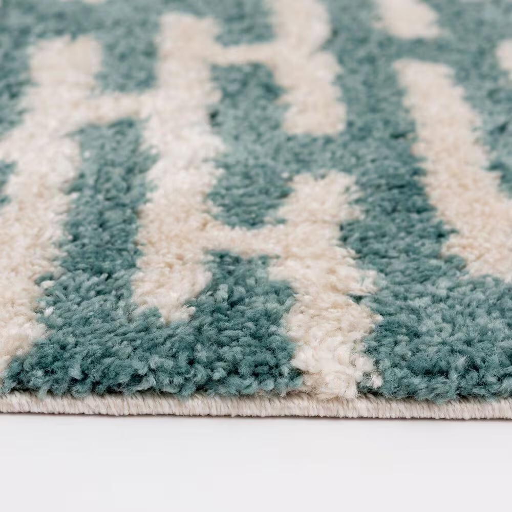 55426-central-oriental-tulsa-gordie-7-10-x-9-10-aqua-and-white-sand-area-rug-1.jpg