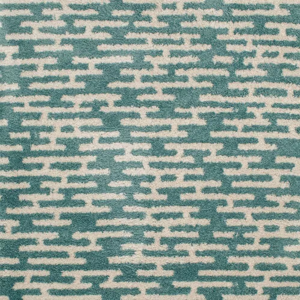 55426-central-oriental-tulsa-gordie-7-10-x-9-10-aqua-and-white-sand-area-rug-1.jpg
