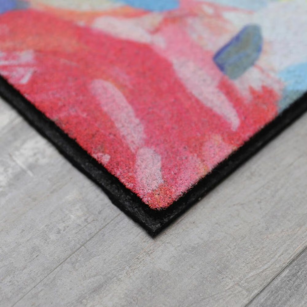 55729-mohawk-doorscapes-1-6-x-2-6-pink-and-red-door-mat-1.jpg