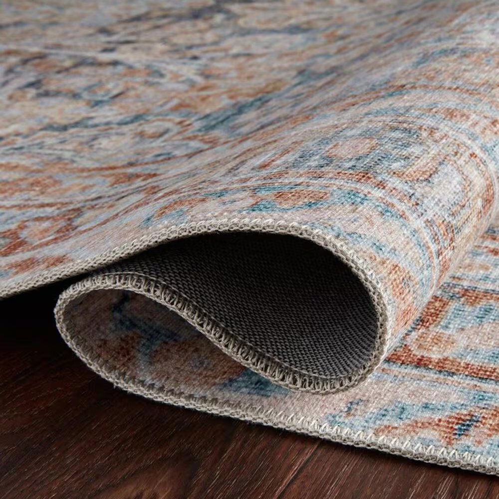 58026-magnolia-home-lenna-lea-02-7-6-x-9-6-ocean-and-apricot-area-rug-1.jpg