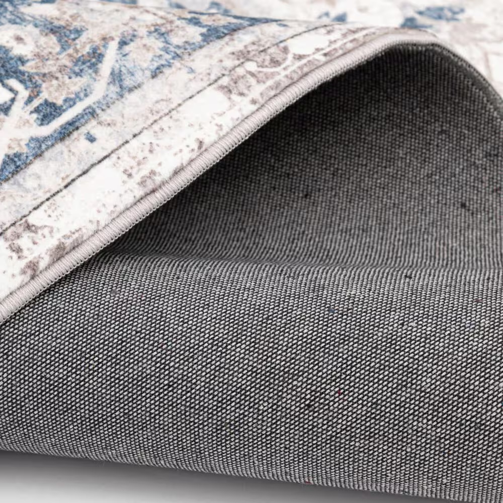 58714-central-oriental-trisha-yearwood-belmont-jabari-5-x-7-tan-and-dark-blue-area-rug-1.jpg