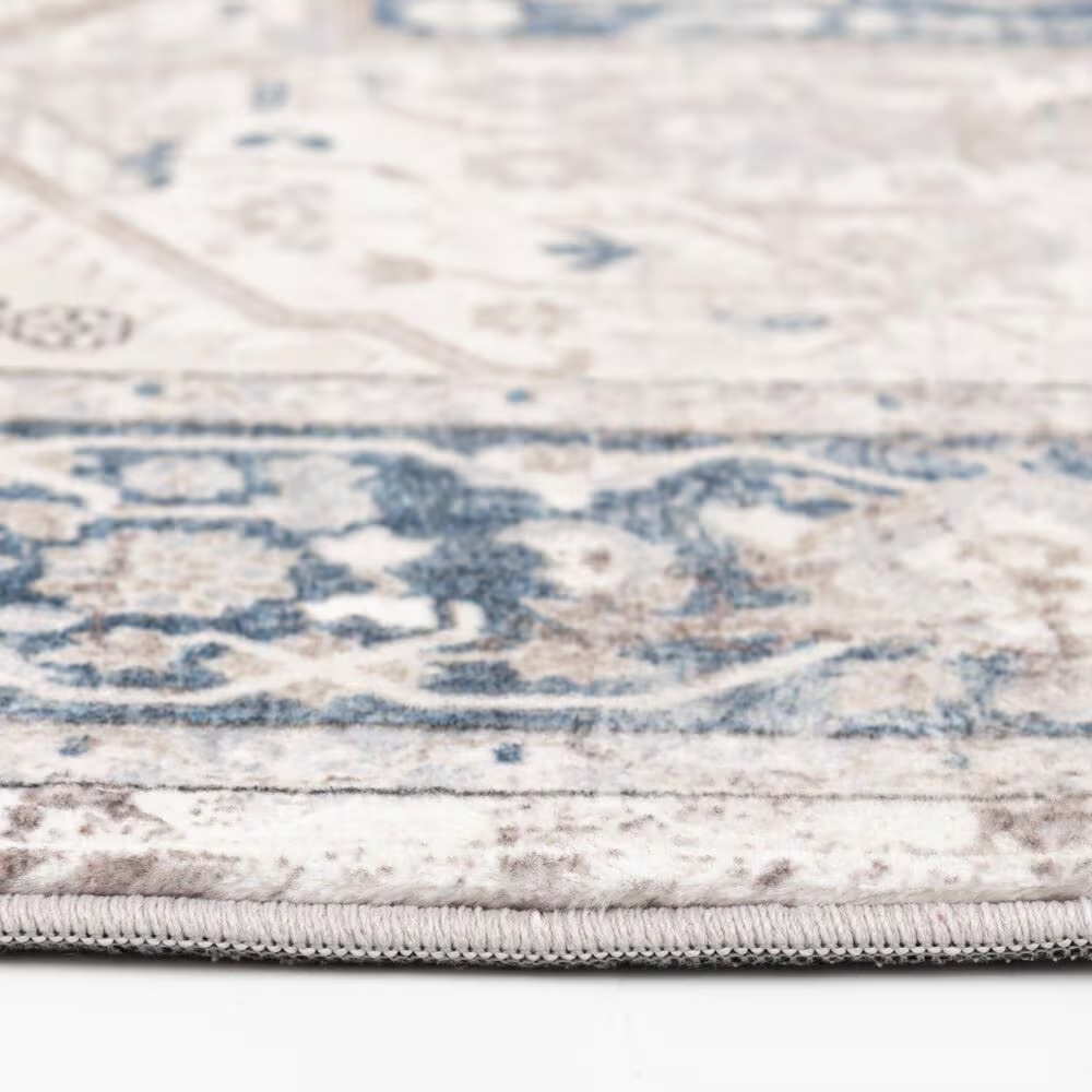 58714-central-oriental-trisha-yearwood-belmont-jabari-5-x-7-tan-and-dark-blue-area-rug-1.jpg
