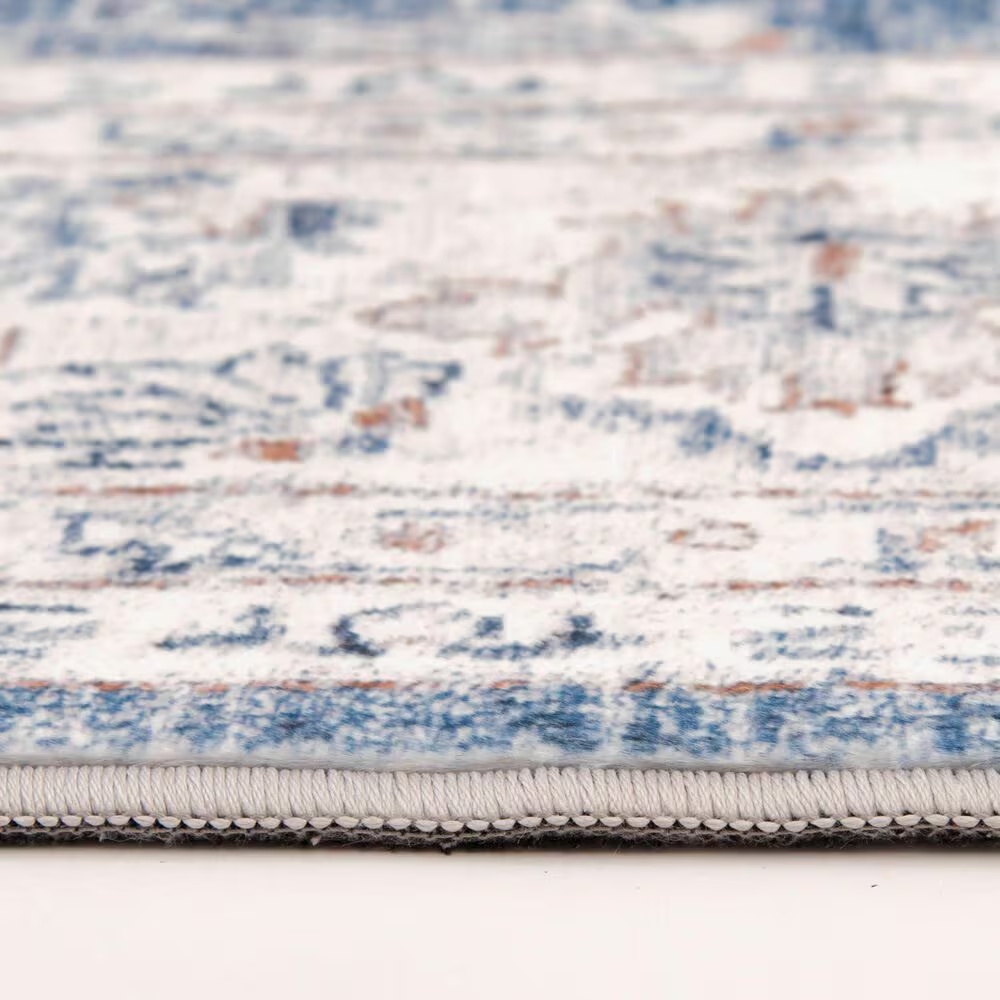 58715-central-oriental-trisha-yearwood-belmont-malian-5-x-7-blue-and-ivory-area-rug-1.jpg