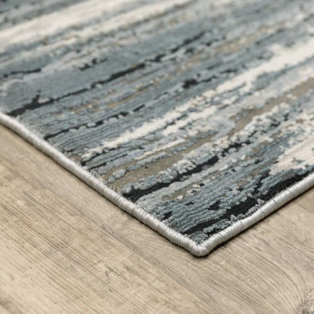 58803-oriental-weavers-caravan-faded-brush-2-3-x-7-6-beige-and-blue-runner-1.jpg