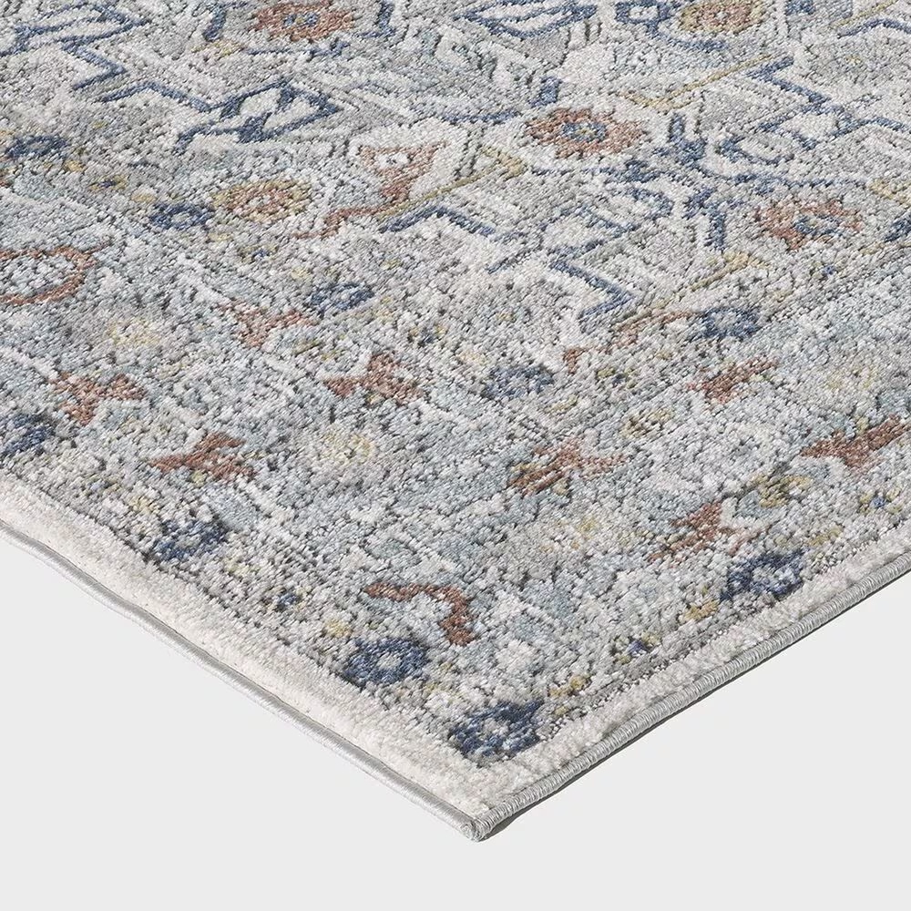 65678-central-oriental-orient-dania-7-10-x-9-10-cream-and-light-blue-area-rug-1.jpg
