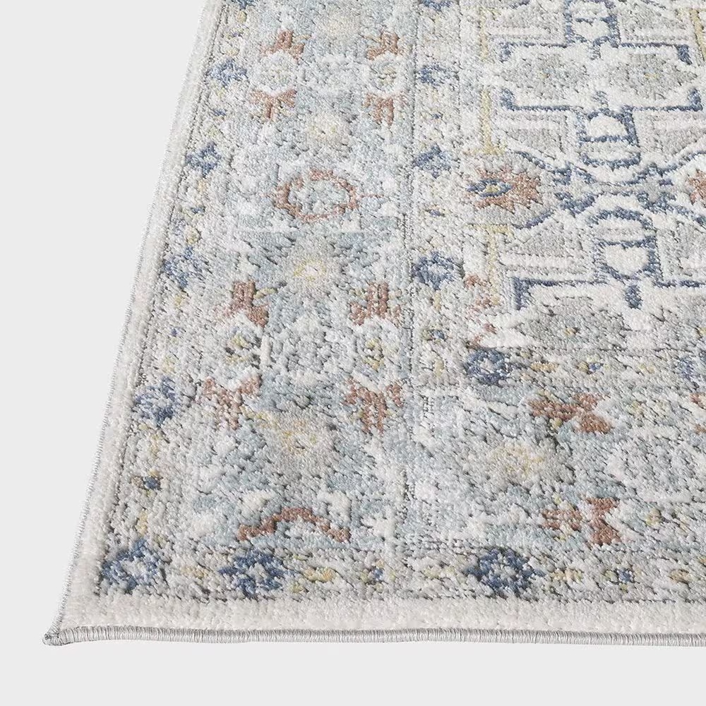 65678-central-oriental-orient-dania-7-10-x-9-10-cream-and-light-blue-area-rug-1.jpg