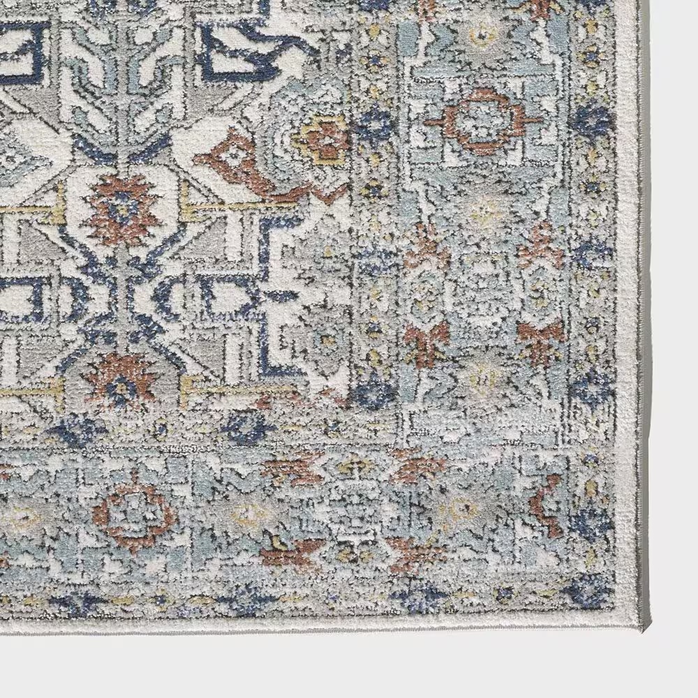 65678-central-oriental-orient-dania-7-10-x-9-10-cream-and-light-blue-area-rug-1.jpg