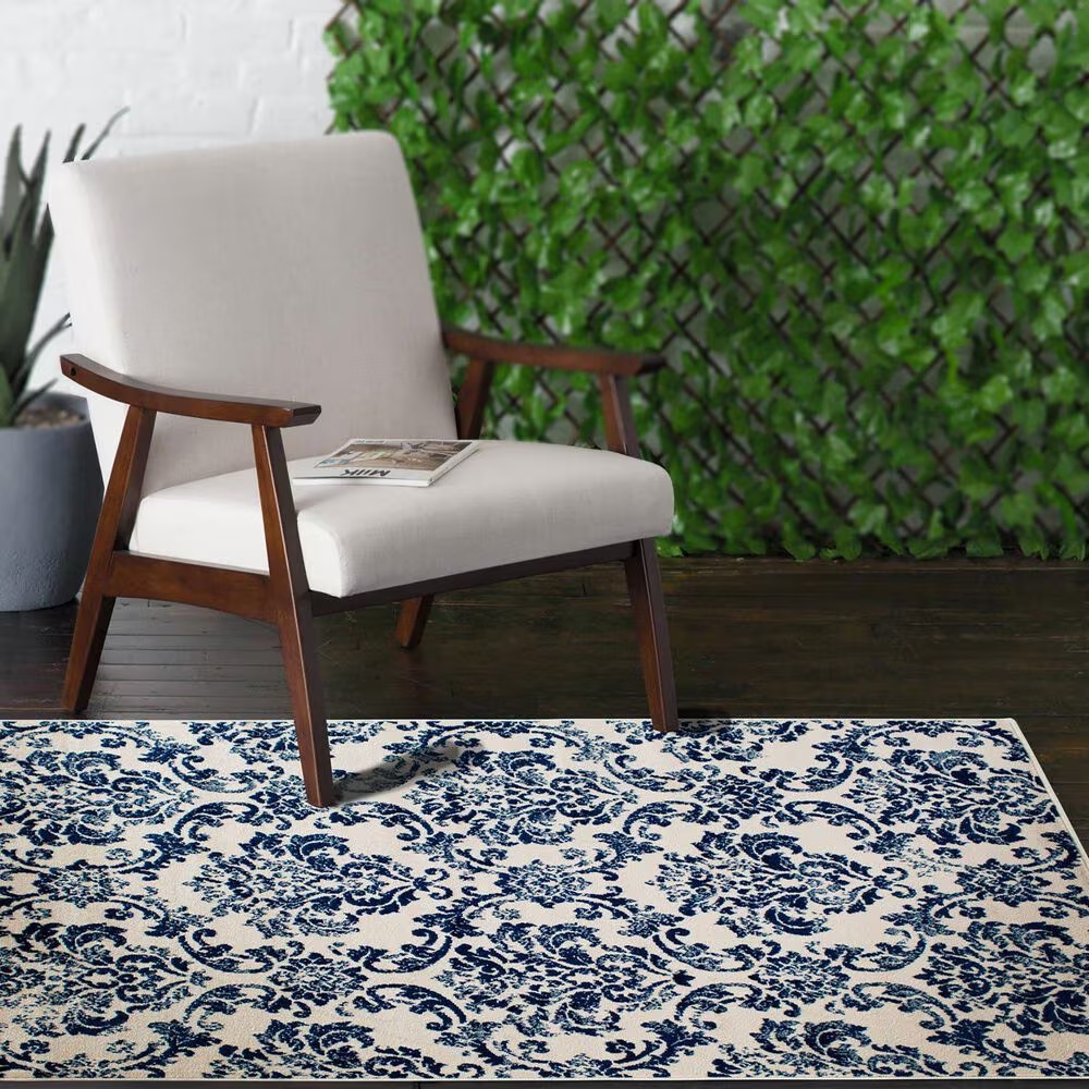 65748-central-oriental-terrace-tropic-sea-isle-7-10-x-9-10-snow-and-sapphire-area-rug-1.jpg