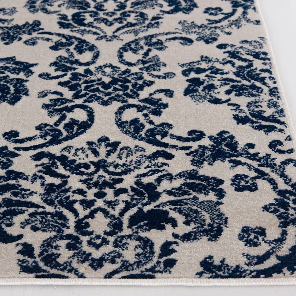 65748-central-oriental-terrace-tropic-sea-isle-7-10-x-9-10-snow-and-sapphire-area-rug-1.jpg